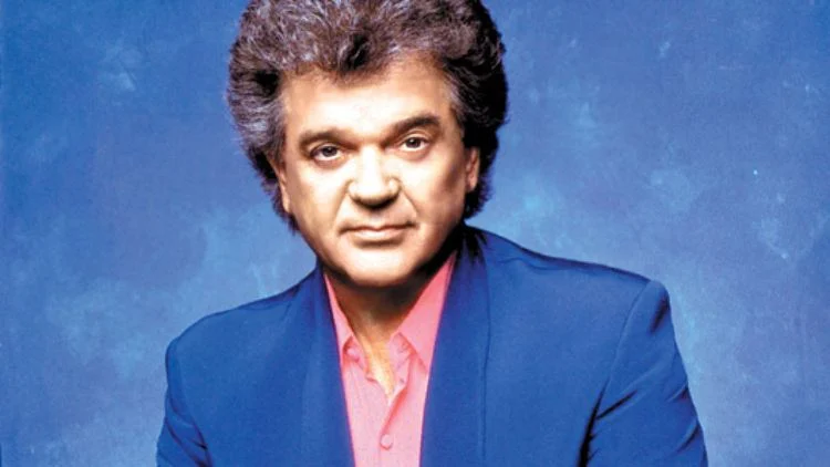 Conway Twitty – She Sure Does Make It Hard To Go