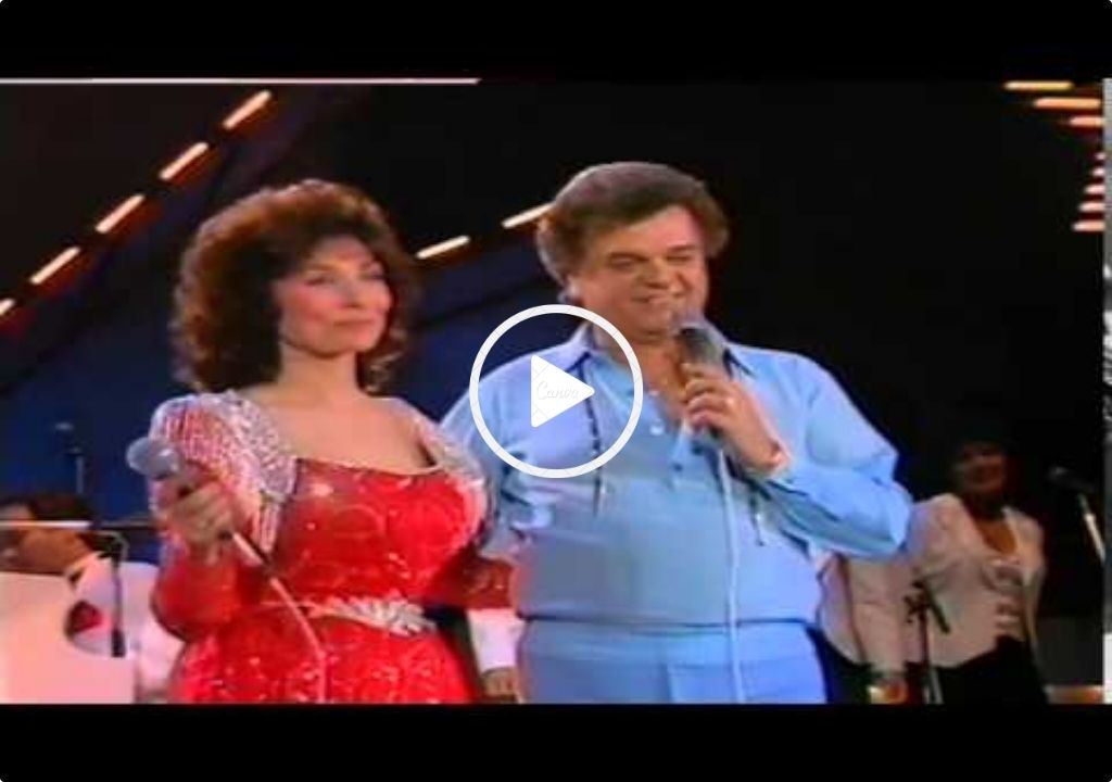 Conway Twitty and Loretta Lynn – What’s A Little Love Between Friends